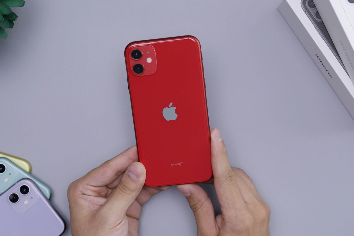 Apple iPhone rouge sida